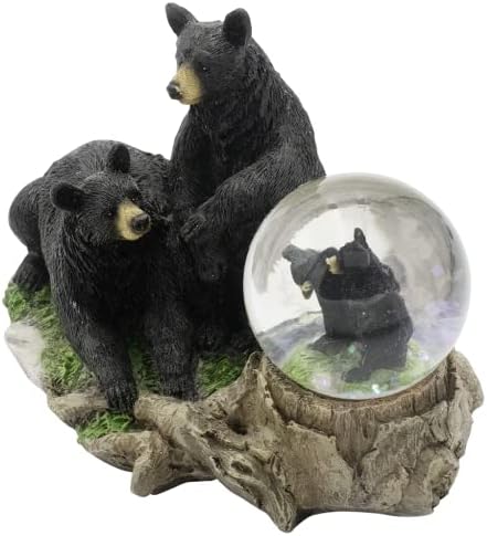 2 דובים שחורים מעריצים את גלובוס השלג האהוב